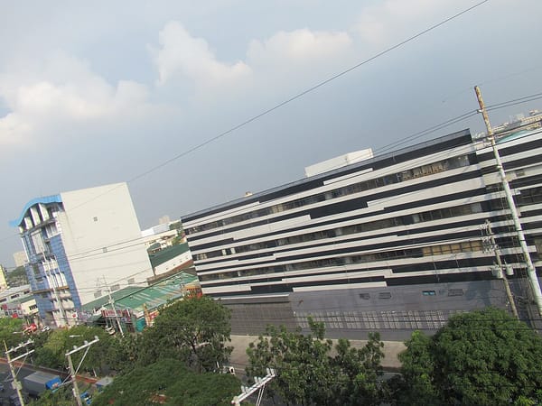 Philippine Central Bank Cuts Rate to 5.5% as Inflation Eases